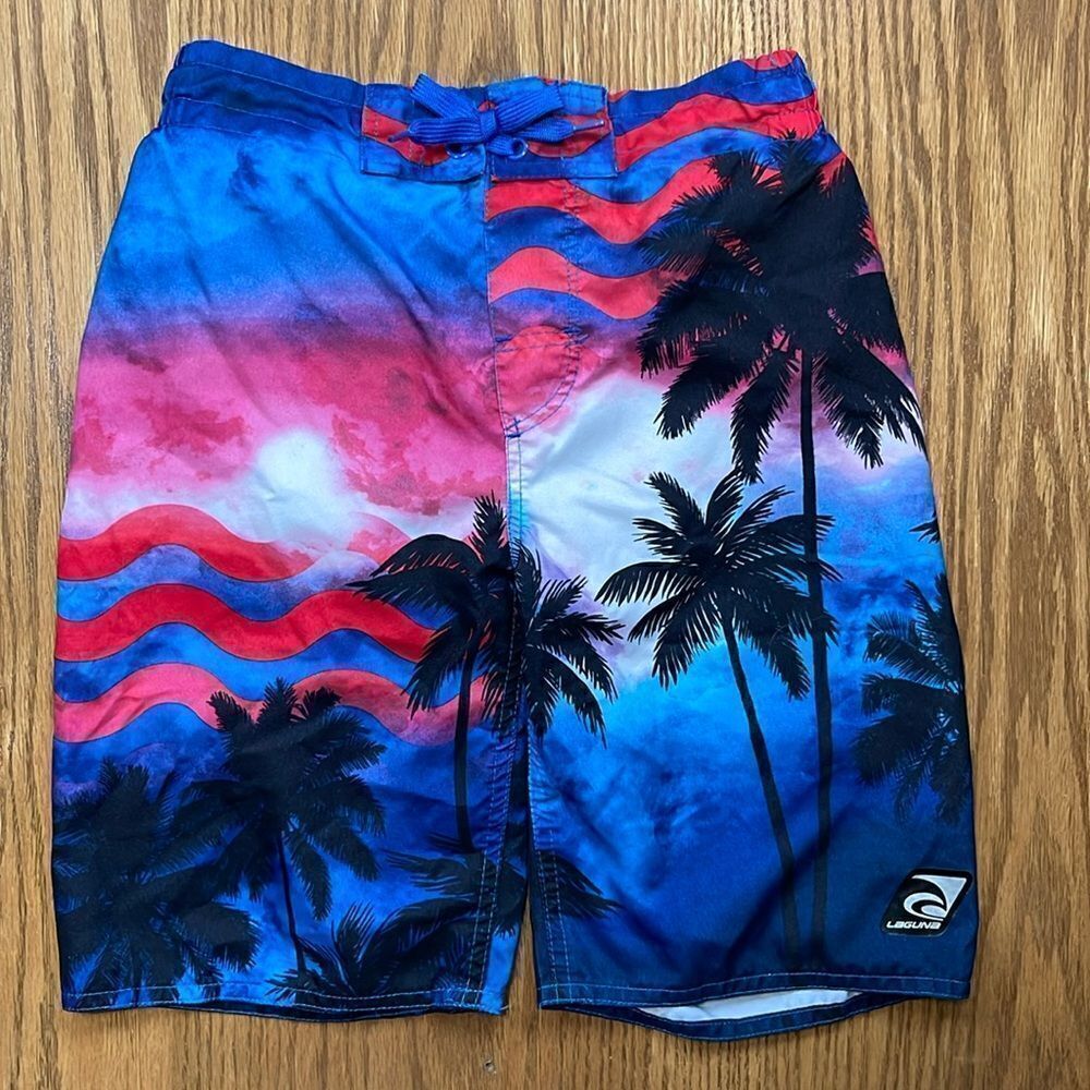 Laguna swimming shorts. Drawstring waist. Size medium (10/12). Pocket.